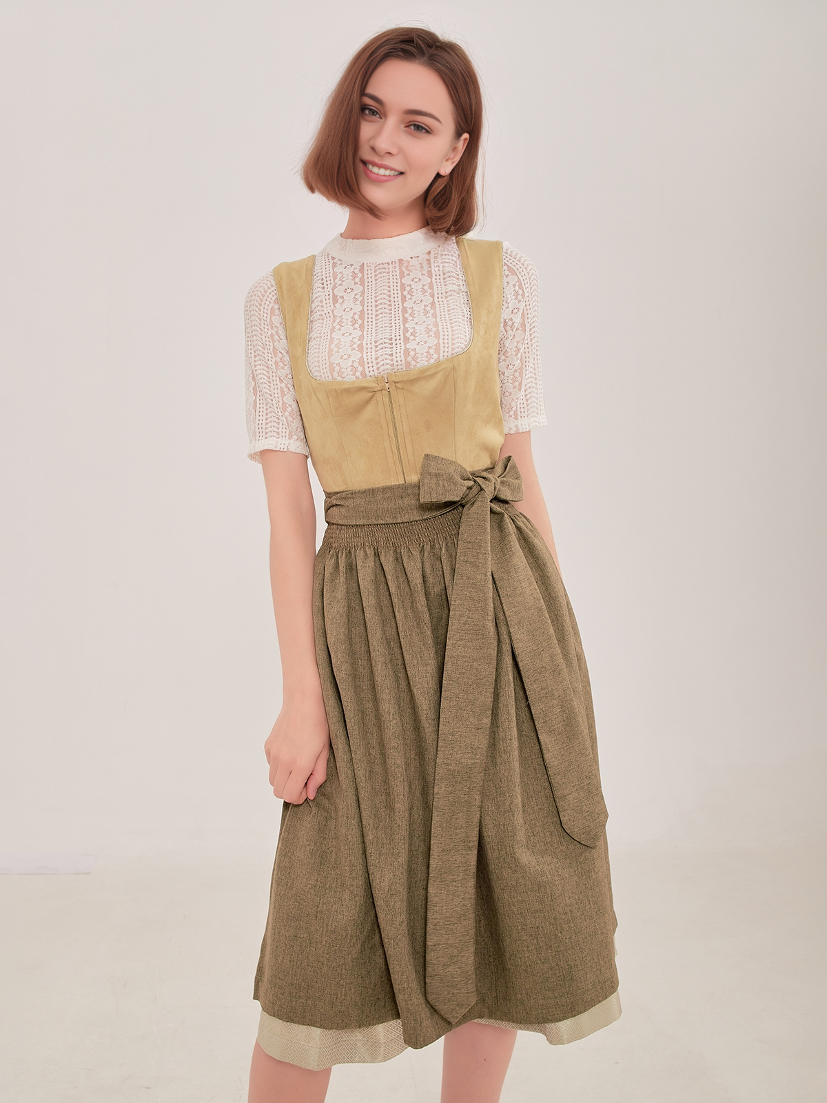 Dirndl mit Lederärmeln in Grün